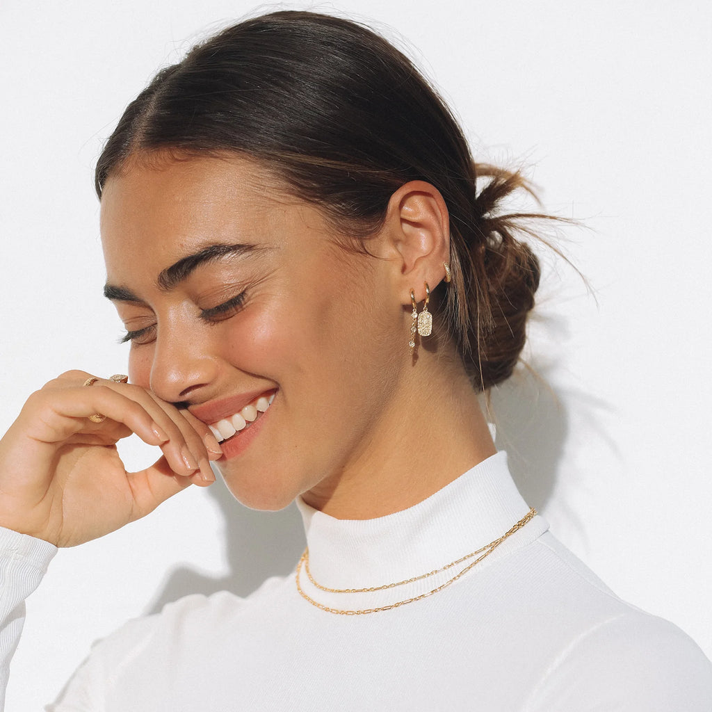 PALOMA Gold Huggie Earrings