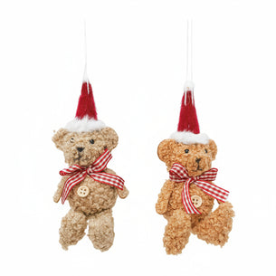 Two teddy bear ornaments with red hats and checkered ribbons on a white background
