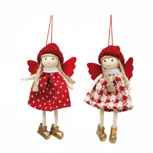 Two fairy figurines with red hats and dresses on a white background