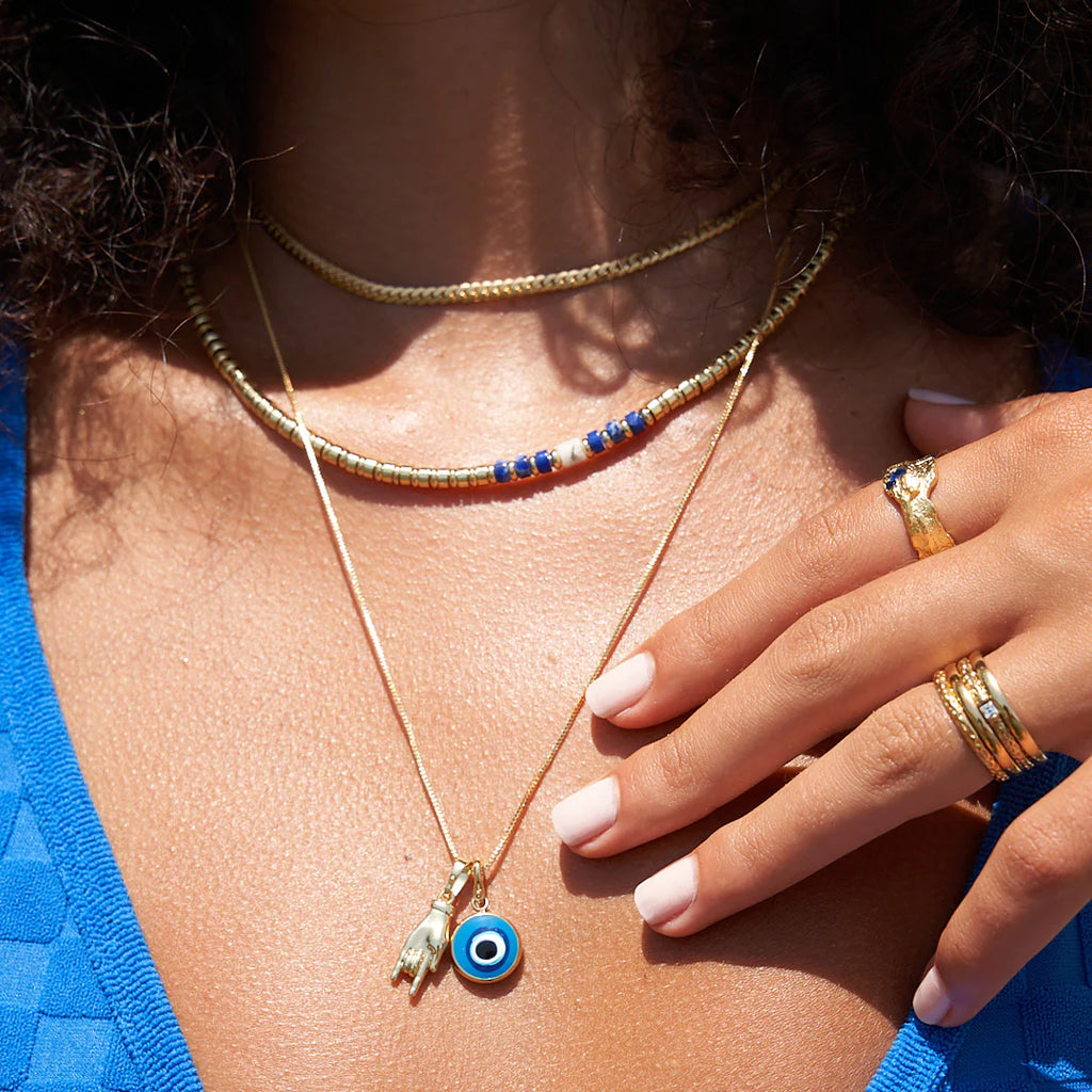 OCCHIO GOLD CHARM NECKLACE